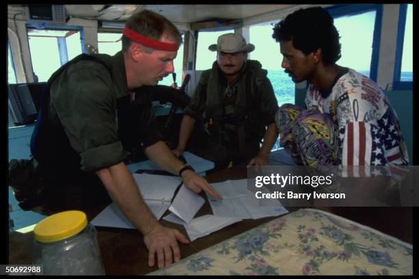 Navy boarding party from USS Doyle in search & seizure aboard Pakistani dhow ship bound for Iraq, enforcing UN Maritime Interception OP imposing...