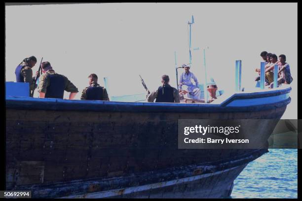 Navy boarding party from USS Doyle in search & seizure aboard Pakistani dhow ship bound for Iraq, enforcing UN Maritime Interception OP imposing...