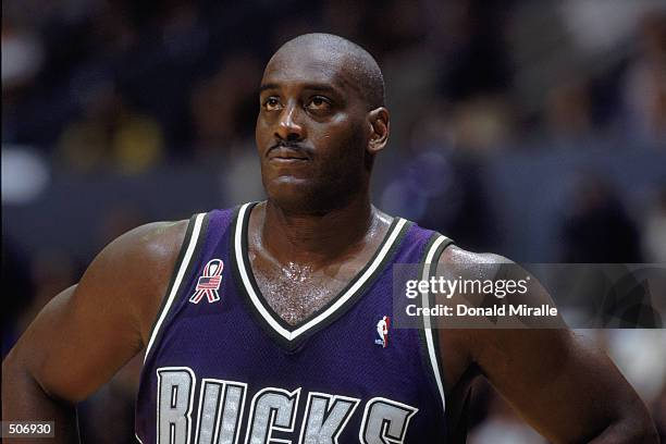 Forward Anthony Mason of the Milwaukee Bucks watches the game during the NBA game against the Los Angeles Lakers at the Staples Center in Los...