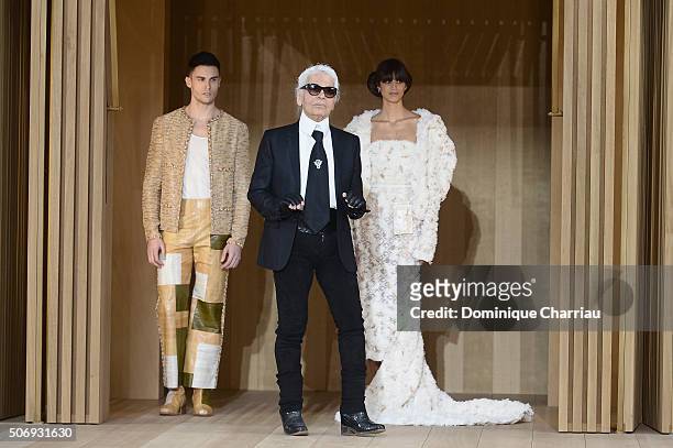 Baptiste Giabiconi, a model and Karl Lagerfeld pose on the runway during the Chanel Spring Summer 2016 show as part of Paris Fashion Week on January...
