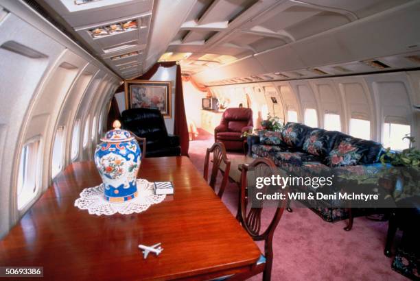 Dining & living area of home of beautician Jo Ann Ussery, which is converted Boeing 727 fuselage.