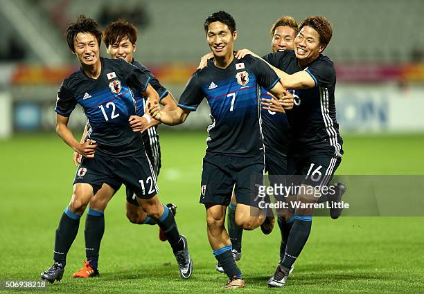 Riki Harakawa of Japan celebrates scoring the winning goal during the AFC U-23 Championship semi final match between Japan and Iraq at the Abdullah...