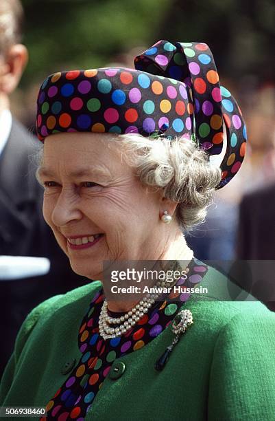 Queen Elizabeth II wears a Marie O'Regan dotted hat during a tour of Hungary on May 07, 1993 in Budapest, Hungary.