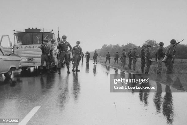 National Guardsmen showing strong presence as Freedom Riders make bus trip from Montgomery, Alabama to Jackson, Mississippi.