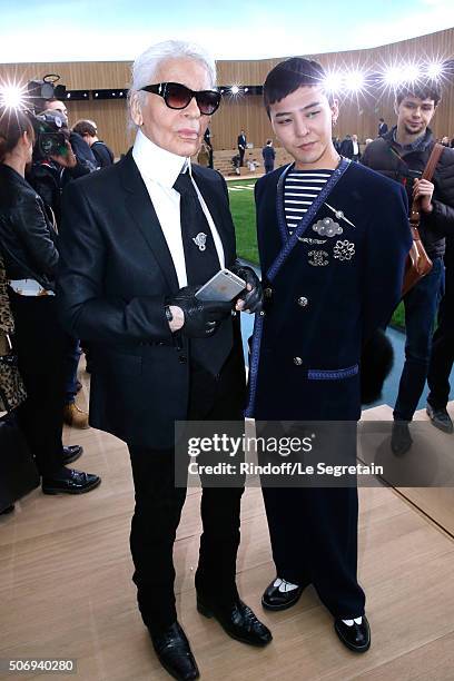 Stylist Karl Lagerfeld and Singer G-Dragon pose after the Chanel