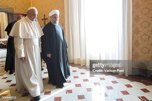 Pope Francis receives in audience with President of Iran Hassan Rouhani at his private library in the Apostolic Palace on January 26, 2016 in Vatican...