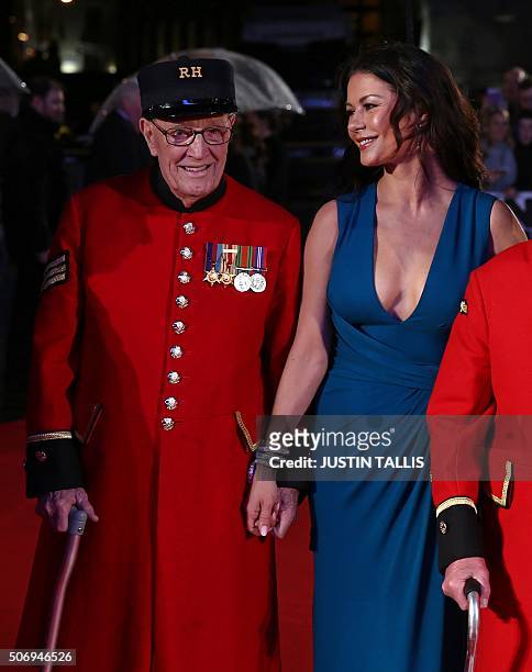 British actress Catherine Zeta-Jones arrives with Chelsea Pensioners for the world premiere of the film Dads Army in London on January 26, 2016. /...