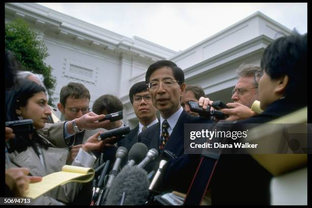 Hong Kong legislator Martin Lee speaking to press outside White House after mtg. W. Pres. Clinton & VP Gore as return of Hong Kong to mainland...