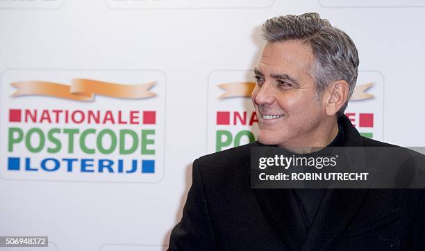 Actor George Clooney arrives at the Goed Geld Gala charity event at the Carre Theatre in Amsterdam on January 26, 2016. == NETHERLANDS OUT == / AFP /...