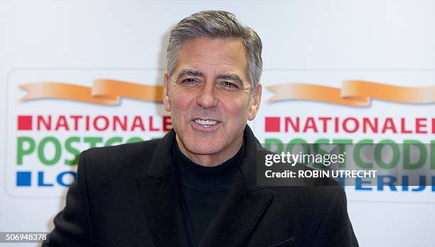 Actor George Clooney arrives at the Goed Geld Gala charity event at the Carre Theatre in Amsterdam on January 26, 2016. == NETHERLANDS OUT == / AFP /...