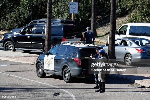 California Highway Patrol officers control traffic outside Naval Medical Center San Diego after reports of gunfire inside the Military Hospital on...