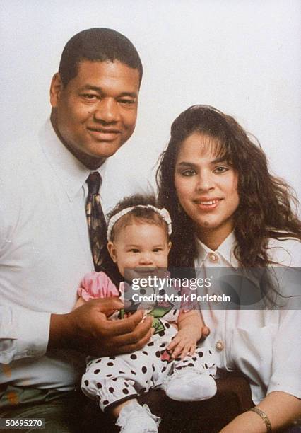 Oklahoma City Police Officer Terry Yeakey posing w. Wife Tanya & baby daughter McKenna; 4 yrs. Later Yeaky would commit suicide 4 days before a...