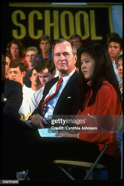 Republican presidential candidate VP George Bush sitting w. Students during campaign visit to Arapahoe High School.