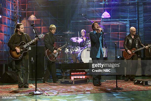 Episode 2218 -- Pictured: Rob Hotchkiss, Charlie Colin, Scott Underwood, Patrick Monahan, and Jimmy Stafford of rock band Train perform on February...