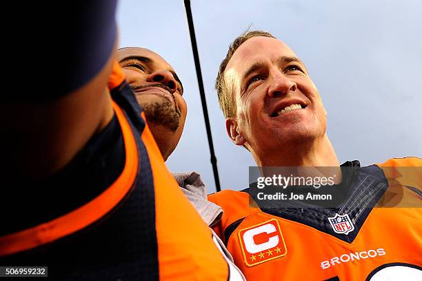 Denver Broncos tackle Ryan Harris grabbed quarterback Peyton Manning for a selfie after winning 20-18 over the New England Patriots in the AFC...