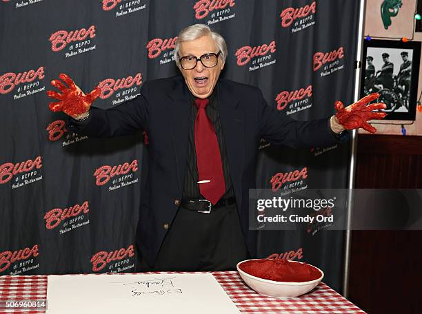 Famed mentalist The Amazing Kreskin has his handprints immortalized in marinara sauce at Buca di Beppo Times Square on January 26, 2016 in New York...