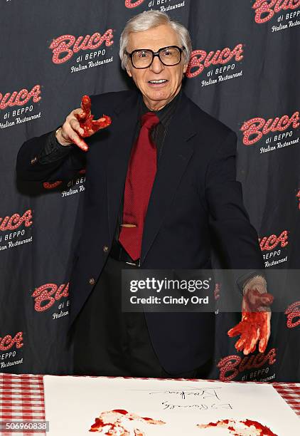 Famed mentalist The Amazing Kreskin has his handprints immortalized in marinara sauce at Buca di Beppo Times Square on January 26, 2016 in New York...