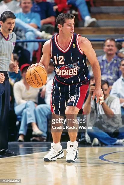 Matt Maloney of the Houston Rockets dribbles against the Sacramento Kings circa 1997 at Arco Arena in Sacramento, California. NOTE TO USER: User...