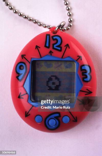 Bandai Corp.'s. Tamagotchi, tiny, birdlike virtual pet which lives on minicomputer screen, growing from electronic chick to adult in 10 days but only...