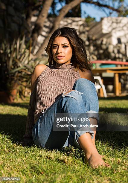 Actress Mayra Leal poses for a photos on the beach in Malibu on January 26, 2016 in Los Angeles, California.