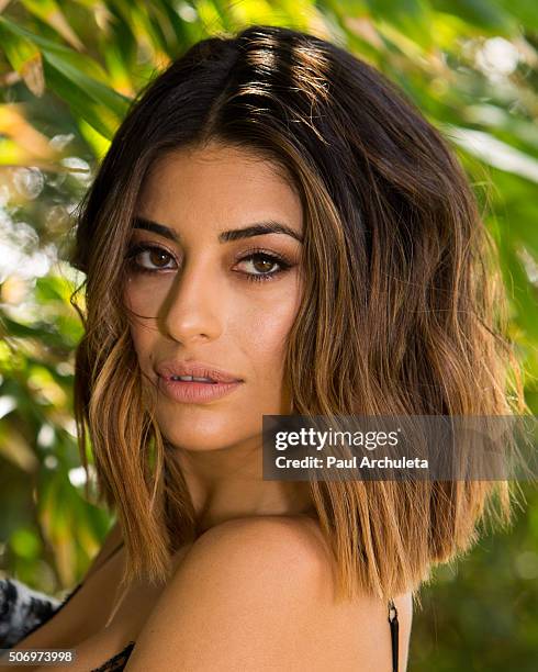 Actress Mayra Leal poses for a photos on the beach in Malibu on January 26, 2016 in Los Angeles, California.