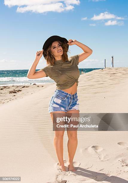 Actress Mayra Leal poses for a photos on the beach in Malibu on January 26, 2016 in Los Angeles, California.