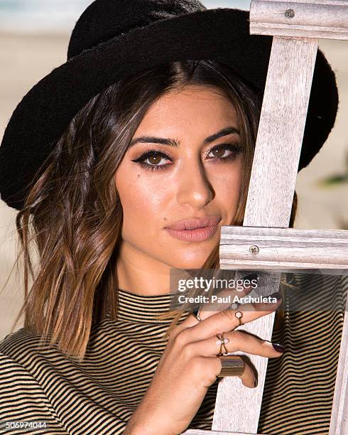 Actress Mayra Leal poses for a photos on the beach in Malibu on January 26, 2016 in Los Angeles, California.