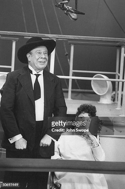 Ethel Merman w. Bert Lahr in gangster costume performing in Cole Porter's musical Anything Goes on TV show The Colgate Comedy Hour.