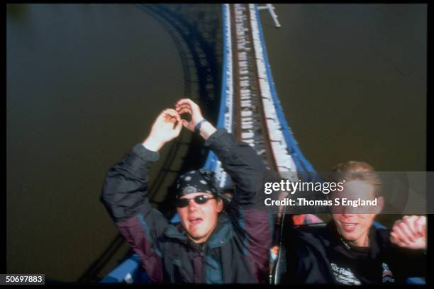 Trill-seekers Jonathan Thompson, Darhy Brown & Dion Hughes aboard the Scream machine roller coaster at Six Flags amusement park during world record...