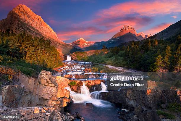 sunrise over swiftcurrent creek - glacier national park foto e immagini stock