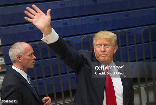 Republican presidential candidate Donald Trump waves to supporters as he leaves a rally on January 26, 2016 in Marshalltown, Iowa. Sheriff Joe...