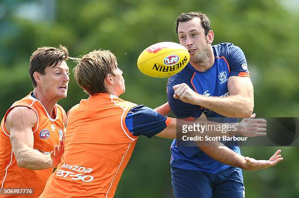 Todd Goldstein of the Kangaroos is tackled during a North Melbourne Kangaroos AFL training session at Arden Street Ground on January 27, 2016 in...