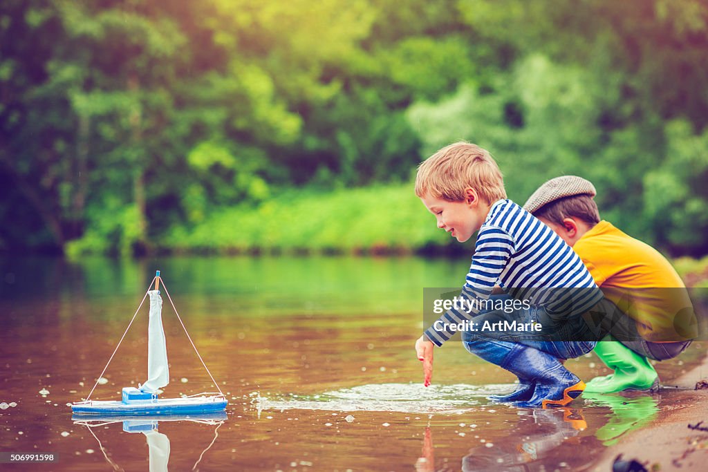 Children with toy ship