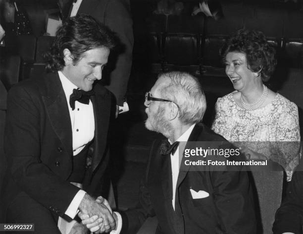 American actor and comedian Robin Williams with British actor Laurence Olivier at the 51st Academy Awards at the Dorothy Chandler Pavilion, Los...
