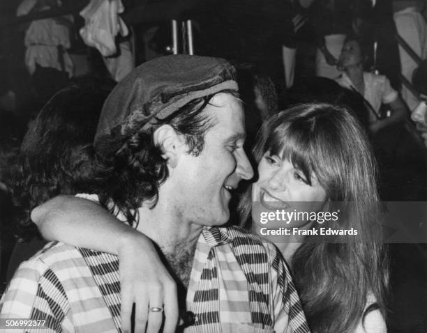 American actor and comedian Robin Williams with actress Pam Dawber at a Paramount Pictures summer wrap party, Paramount Studios, Hollywood, June...