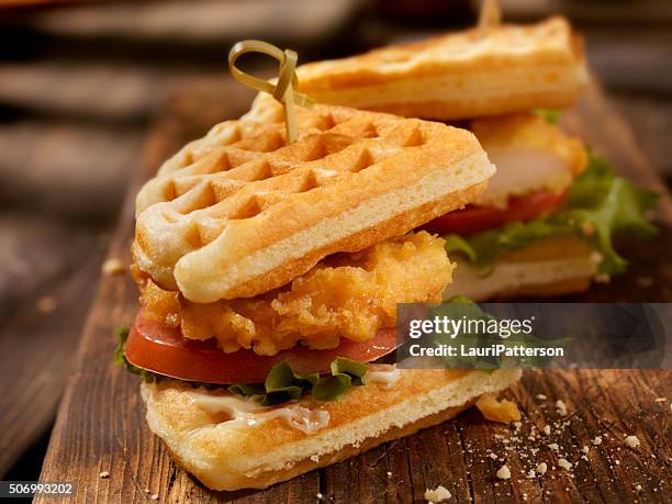 fried chicken and waffle sandwich - crunchy food stock pictures, royalty-free photos & images