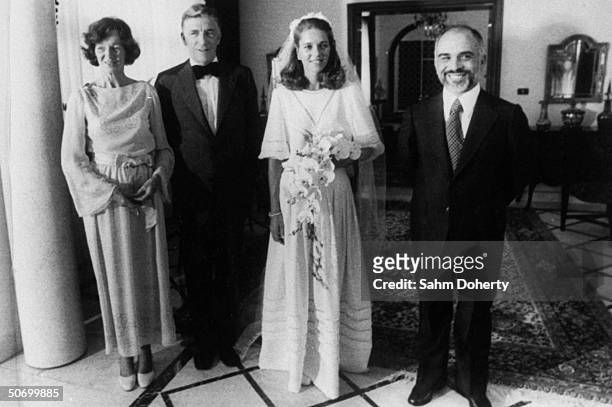 King Hussein of Jordan with bride Lisa Halaby , and her parents Najeeb & Doris in wedding day portrait.