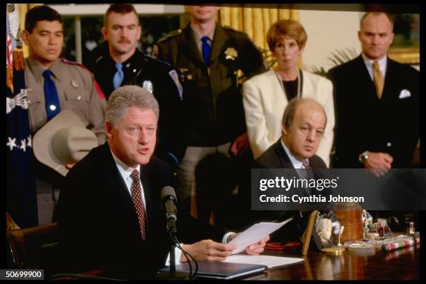 Presodent Bill Clinton during the signing of a directive on child safety locks and other gun issues, in the White House Oval Office, with gun control...