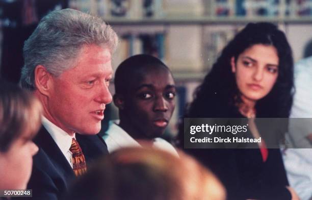 Pres. Bill Clinton students at T.C. Williams High School, presiding over discussion about school violence in wake of massacre at Columbine High...