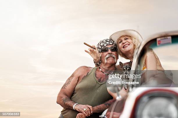 funky mature couple in cuba - funky middle age couple stockfoto's en -beelden