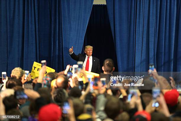Republican presidential candidate Donald Trump arrives to speak during a campaign event at the University of Iowa on January 26, 2016 in Iowa City,...