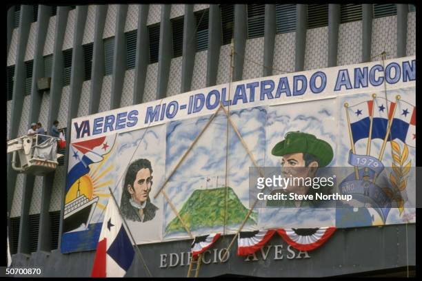 Mural hanging on building commemorating Panama's autonomy in the Canal Zone, w. Depiction of Gen. Omar Herrera Torrijos visible .