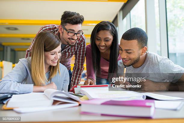 students helping each other - high school student stock pictures, royalty-free photos & images