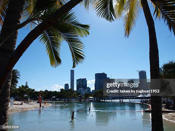 man made beach and city view - brisbane beach stock pictures, royalty-free photos & images