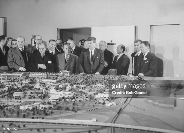 Pres. John Kennedy w. Norman Winston , US Commission to World's Fair, Robert Wagner Mayor of NYC, & Robert Moses , World's Fair Corp. Pres, as they...