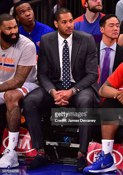 Carmelo Anthony attends the Oklahoma City Thunder vs New York Knicks game at Madison Square Garden on January 26, 2016 in New York City.