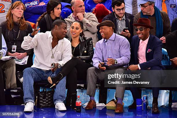 Tracy Morgan, Megan Morgan, guest and J. B. Smoove attend the Oklahoma City Thunder vs New York Knicks game at Madison Square Garden on January 26,...