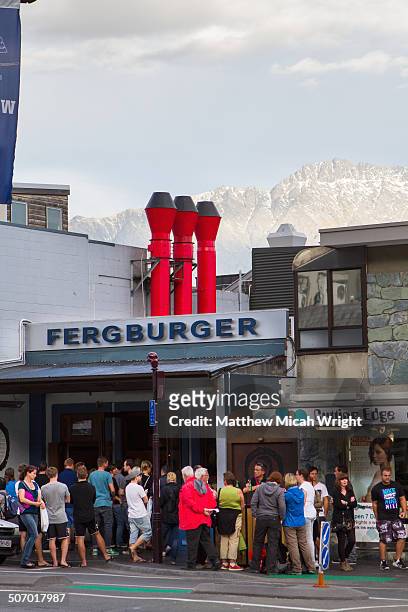 lines form outside of the famous fergburger - fergburger stock pictures, royalty-free photos & images