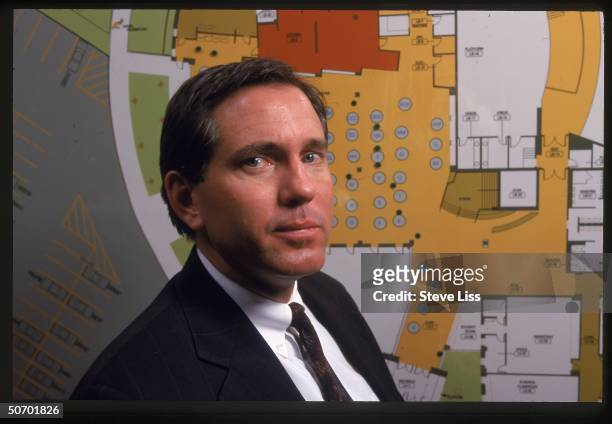 Domestic terrorism squad agent Rich Price framed by chart of Columbine High School cafeteria, working on case of April massacre at school by student...