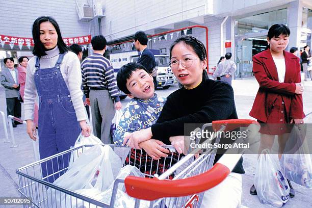 Shoppers in Carrefour Supermarket.